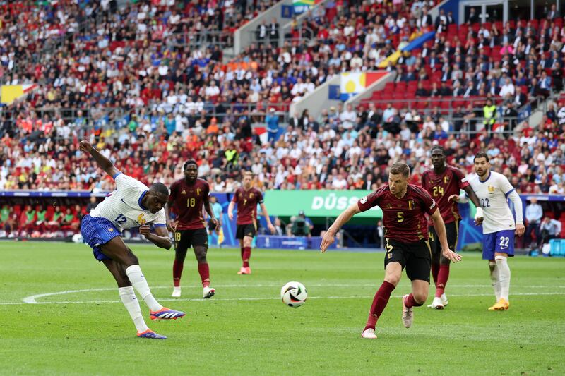 Randal Kolo Muani of France scores the winner via a deflected own goal. Getty Images