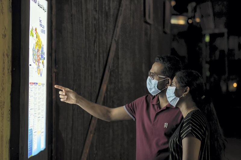 Dubai, United Arab Emirates - Reporter: N/A. Covid-19/Coronavirus. Guests look at a park map. IMG World of Adventure opened on recently to the public with strict Covid-19/Coronavirus safety measures. Tuesday, July 21st, 2020. Dubai. Chris Whiteoak / The National