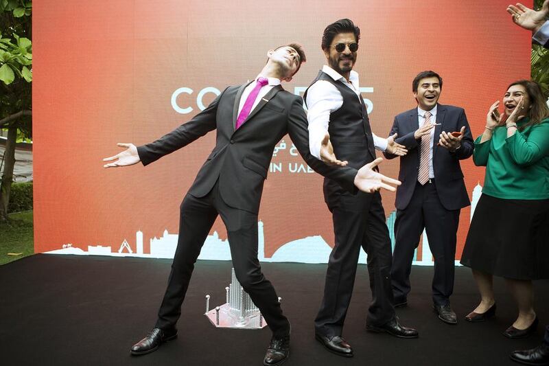 <a href="http://www.thenational.ae/business/property/bildco-starts-rebuilding-with-dubai-concrete-block-factory-and-new-steel-mill">The Bollywood star Shah Rukh Khan</a> poses with Kush Bhatia, left, the son of the Conares chief executive Bharat Bhatia, to announce the installation of the company’s new pipe mill at its facility in the Jebel Ali Free Zone. Christopher Pike / The National