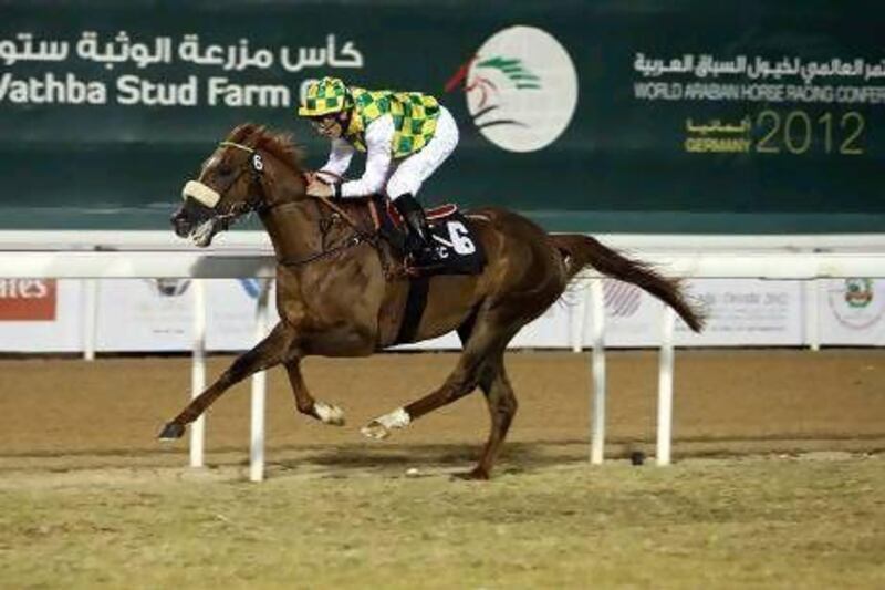 Wayne Smith and Naseem raced to the front on the final bend in the UAE Arabian Derby.