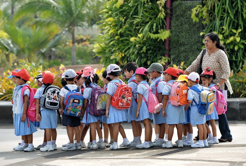 Pre-school children go on an outing in Singapore. AFP