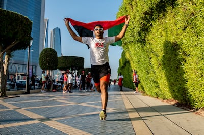 Sadique Ahamed completing his 50km run at the Adnoc building in Abu Dhabi. Vidhyaa Chandrmohan/ The National