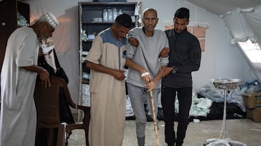 Sufyan Abu Salah, a Palestinian prisoner released by the Israeli army, arrives for a medical examination at a hospital in Rafah in southern Gaza. EPA