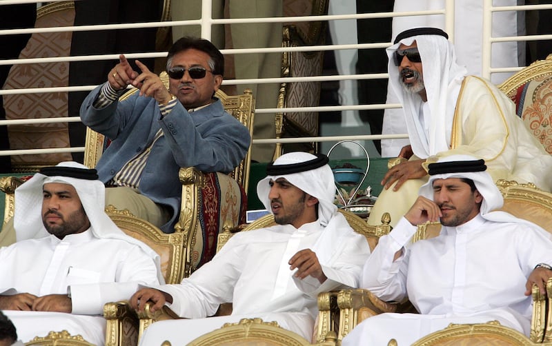 Pakistani President Pervez Musharraf and Emirati Minister of Higher Education Sheikh Nahyan bin Mubarak Al Nahyan (Up-R) attend the first of two day-night Cricket matches between India and Pakistan at the Zayad Cricket Stadium in Abu Dhabi, 18 April 2006. Proceeds from today's match will be donated to the survivors of the massive earthquake that hit Kashmir last October killing more than 73,000 people in Pakistan and 1,300 in India, while revenues from the second game tomorrow will be shared by the Indian and Pakistan cricket boards. AFP Photo/RABIH MOGHRABI / AFP PHOTO / RABIH MOGHRABI