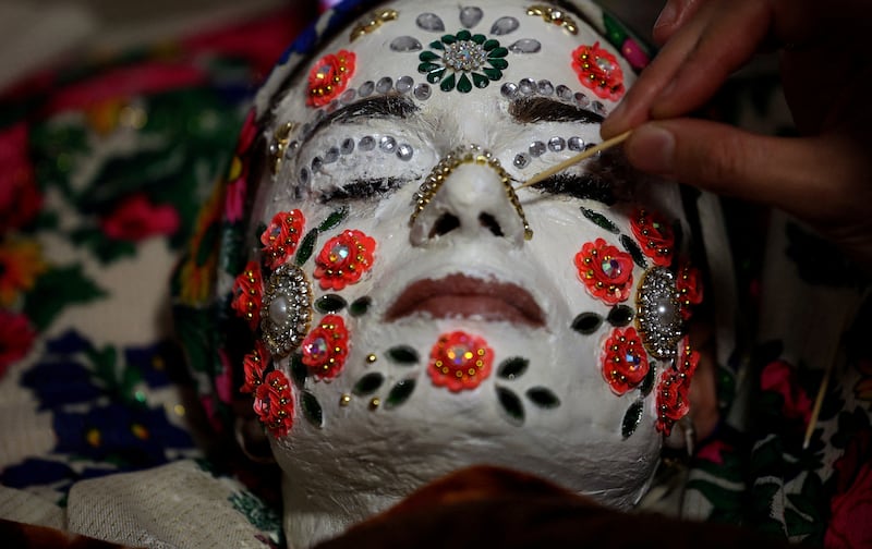 Muslim bride Aysel Gerova, 24, has makeup applied at her wedding ceremony in the village of Ribnovo, in the Rhodope Mountains, Bulgaria. Reuters