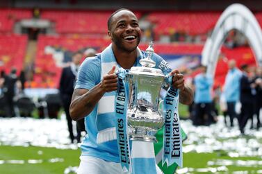 Soccer Football - FA Cup Final - Manchester City v Watford - Wembley Stadium, London, Britain - May 18, 2019 Manchester City's Raheem Sterling celebrates with the trophy after winning the FA Cup REUTERS/David Klein