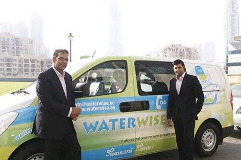 The Kohli brothers, Rishi and Sanuj, are the force behind a car-wash technique that uses a biodegradable spray and cloth - but no water. Jeffrey E Biteng / The National