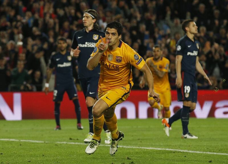 Luis Suarez probably deserved to be sent off against Atletico Madrid on Tuesday, reckons Diego Forlan. Albert Gea / Reuters