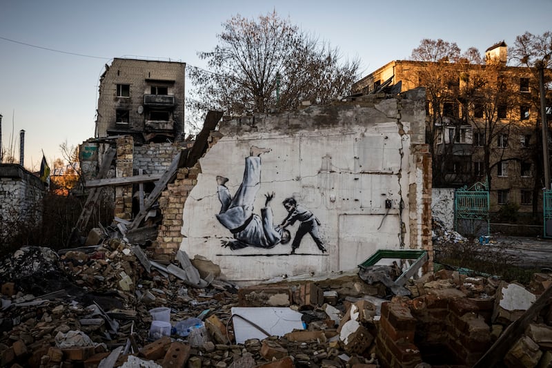 Graffiti on a wall of a damaged building in Borodyanka in Kyiv region, Ukraine. Borodyanka was hit particularly hard by Russian air strikes in the first few weeks of the conflict. Getty Images