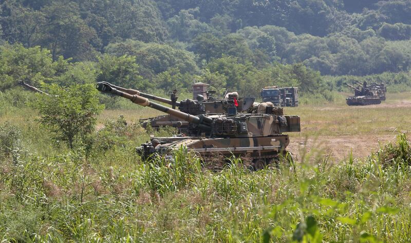 
                  South Korean army soldiers take positions with their K-55 self-propelled howitzers during a military exercise in Paju, South Korea, near the border with North Korea, Monday, Sept. 4, 2017. North Korea said it set off a hydrogen bomb Sunday in its sixth nuclear test, which judging by the earthquake it set off appeared to be its most powerful explosion yet. (AP Photo/Ahn Young-joon)
               