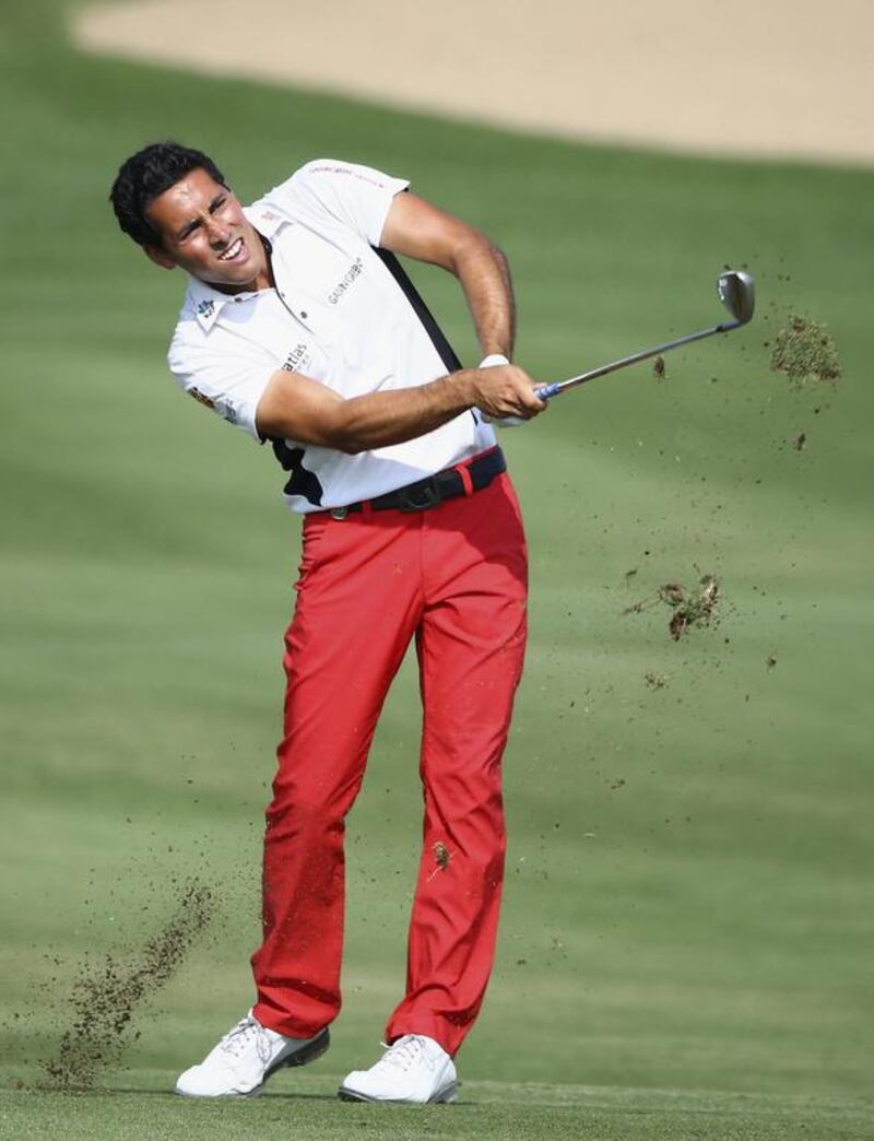 Carlos Pigem of Spain in action during the final round of the Dubai Open at The Els Club Dubai on December 21, 2014 in Dubai, United Arab Emirates.  (Photo by Francois Nel/Getty Images)