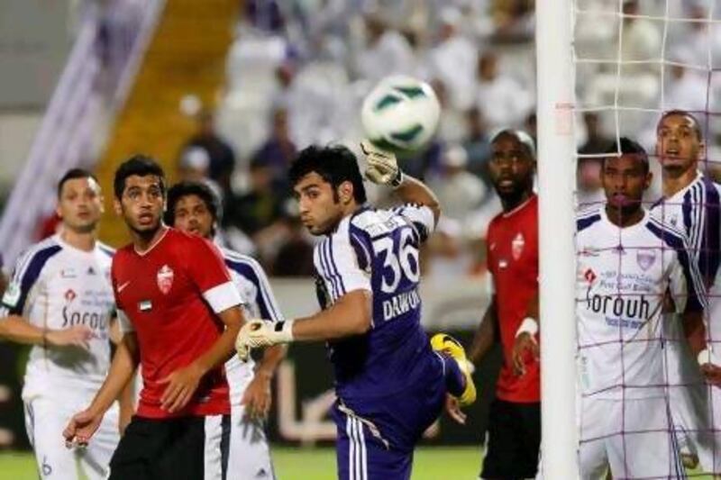 Dawoud Sulaiman, the Al Ain goalkeeper, centre, had a very poor game between the sticks against Al Ahli on Sunday.