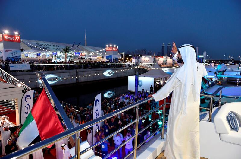 Sheikh Mohammed bin Rashid waves at visitors to the Dubai International Boat Show on Saturday. Wam
