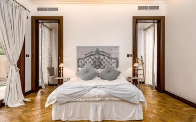 The bedrooms feature wooden flooring. Courtesy LuxuryProperty.com