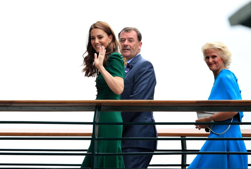 The Duchess of Cambridge arrives on day twelve of the Wimbledon Championships at the All England Lawn Tennis and Croquet Club, Wimbledon wearing a forest green Dolce & Gabanna dress. Photo: PA