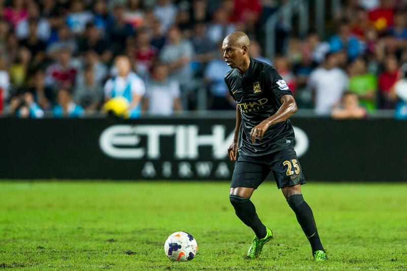 SO KON PO, HONG KONG - JULY 24:  Fernandinho of Manchester City runs with the ball during the Barclays Asia Trophy Semi Final match between Manchester City and South China at Hong Kong Stadium on July 24, 2013 in So Kon Po, Hong Kong.  (Photo by Victor Fraile/Getty Images)