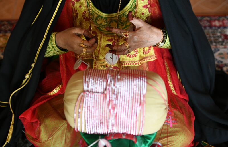 Women practise the traditional techniques together during the week with hopes of selling some of their creations through the centre. Khushnum Bhandari / The National