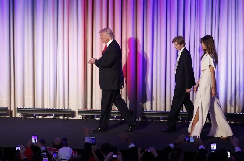 Donald Trump is followed by members of his family as he arrives to address supporters at his election night rally in Manhattan, New York. Andrew Kelly / Reuters