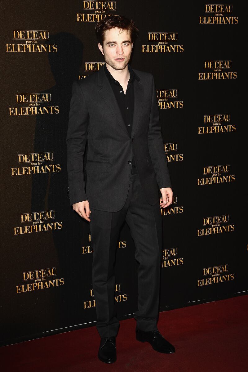 In a black suit and shirt for the French premiere of 'Water For Elephants' in Paris on April 28, 2011. Getty Images