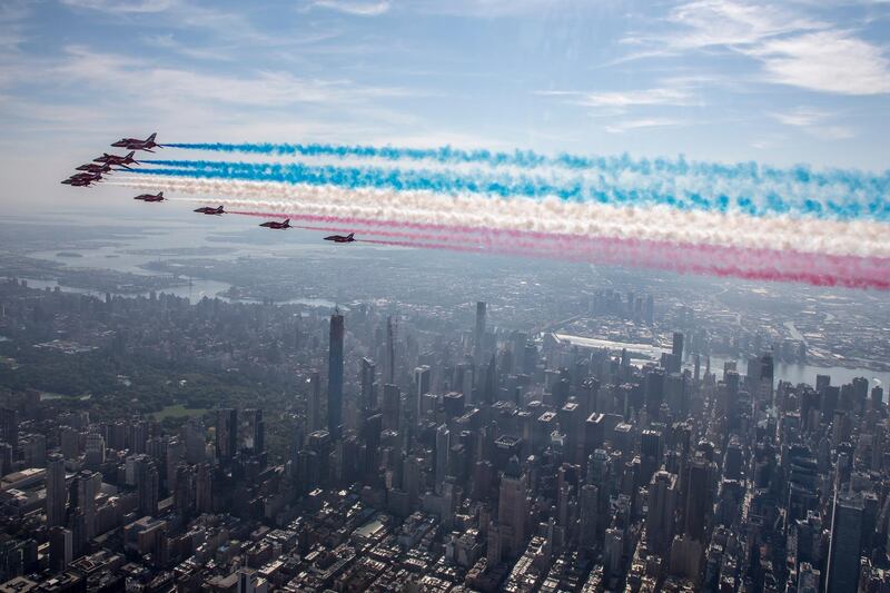 Britain's Royal Air Force aerobatic team the Red Arrows fly over New York City, U.S.  Reuters