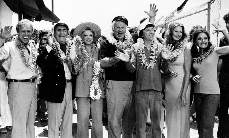 The cast of 'Gilligan's Island,' from left, Russell Johnson as the professor; Jim Backus as Thurston Howell III; Natalie Schafer as Mrs Howell III; Alan Hale Jr as the skipper; Bob Denver as Gilligan; Judith Baldwin replacing original cast member Tina Louise, as Ginger, and Dawn Wells as Mary Ann, posing during filming of a two-hour reunion show, 'The Return from Gilligan's Island' in Los Angeles, October 2, 1978. AP