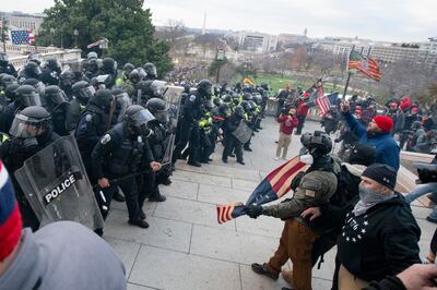 An alarming number of Capitol rioters were current and former police officers. AP