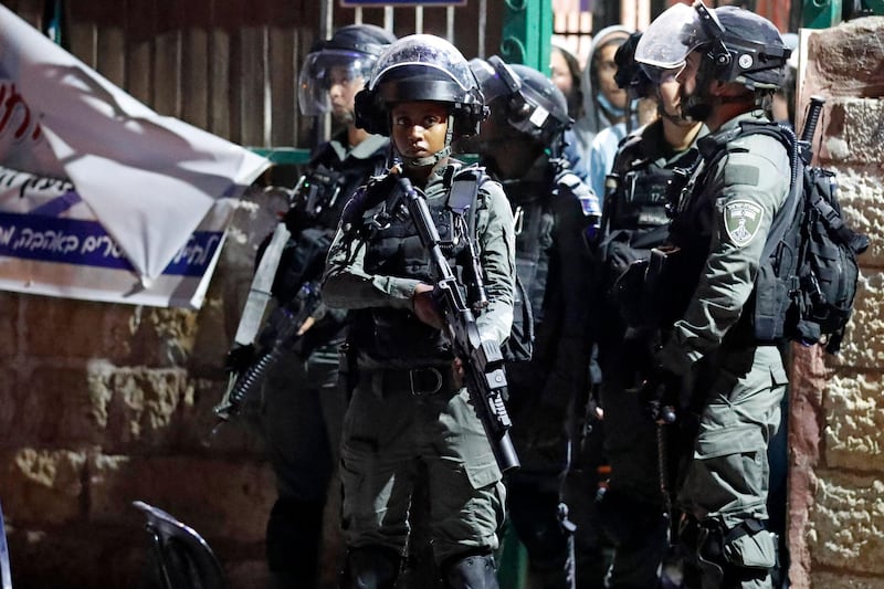 Israeli border guards gather in the East Jerusalem neighbourhood of Sheikh Jarrah. AFP