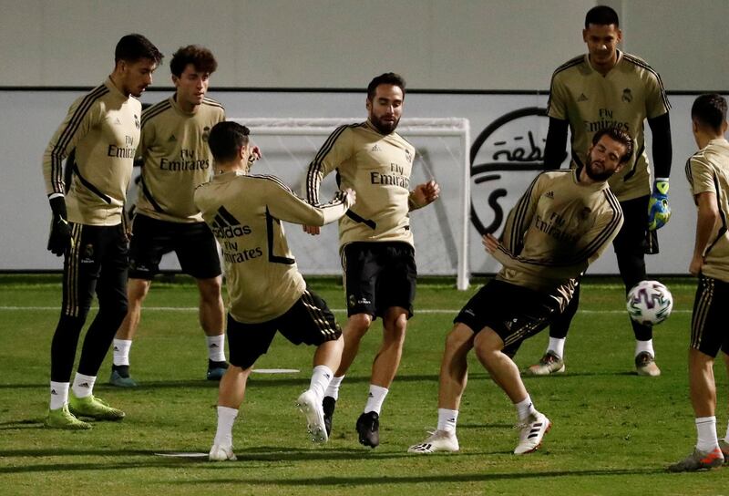 Dani Carvajal, centre, takes part in a training sessin with his Real Madrid teammates. Reuters