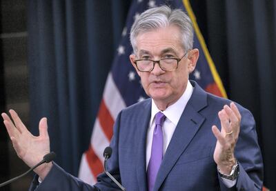 US Federal Reserve Chairman Jerome Powell speaks during a press conference after a Federal Open Market Committee meeting in Washington, DC on July 31, 2019. - The US Federal Reserve cut the benchmark lending rate on Wednesday for the first time in more than a decade, moving to stimulate the economy after a year of sustained pressure from President Donald Trump. Powell signaled Wednesday that the US central bank is not launching a new round of interest rate cuts to boost the economy. With many economists expected at least one more rate cut this year, Powell said the move Wednesday was to "insure" the economy against global uncertainties (Photo by ANDREW CABALLERO-REYNOLDS / AFP)