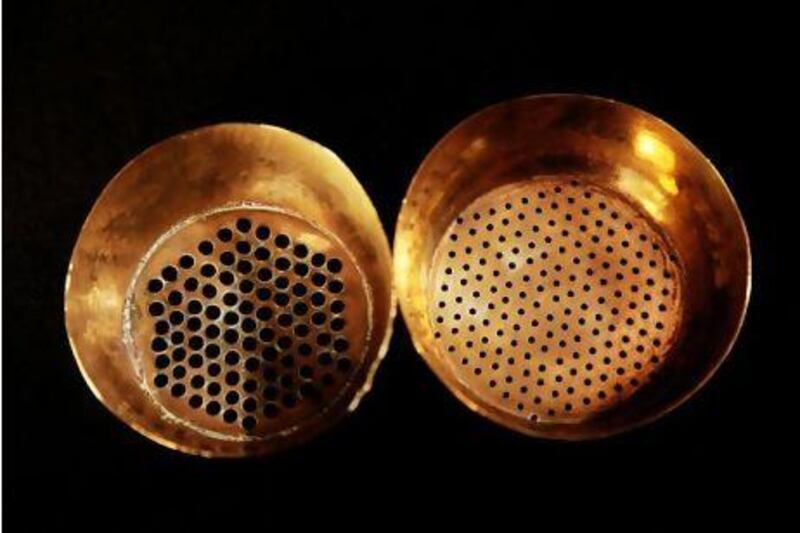These brass sieves, from Abu Dhabi, would have been an essential tool used by local merchants to sort the catch for resale.