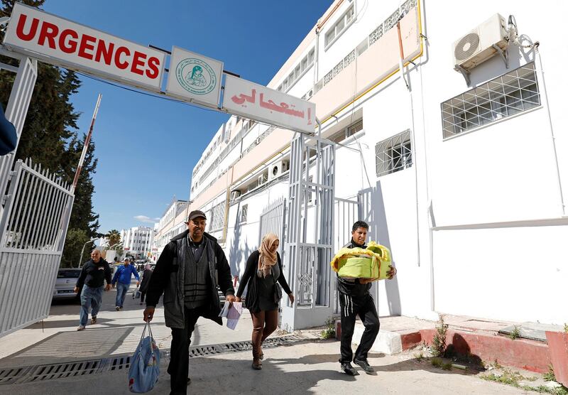 People walk near the Wassila Bourguiba Hospital in Tunis, Tunisia, March 10, 2019. REUTERS/Zoubeir Souissi