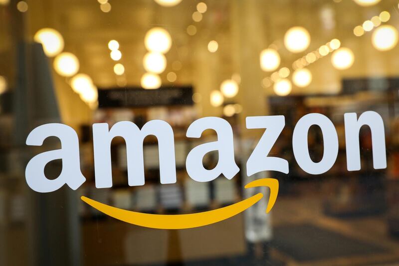 FILE PHOTO: The logo of Amazon is seen on the door of an Amazon Books retail store in New York City, U.S., February 14, 2019. REUTERS/Brendan McDermid/File Photo