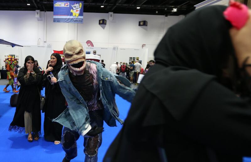 Guests in costume attends the Middle East Film and Comic Con. EPA
