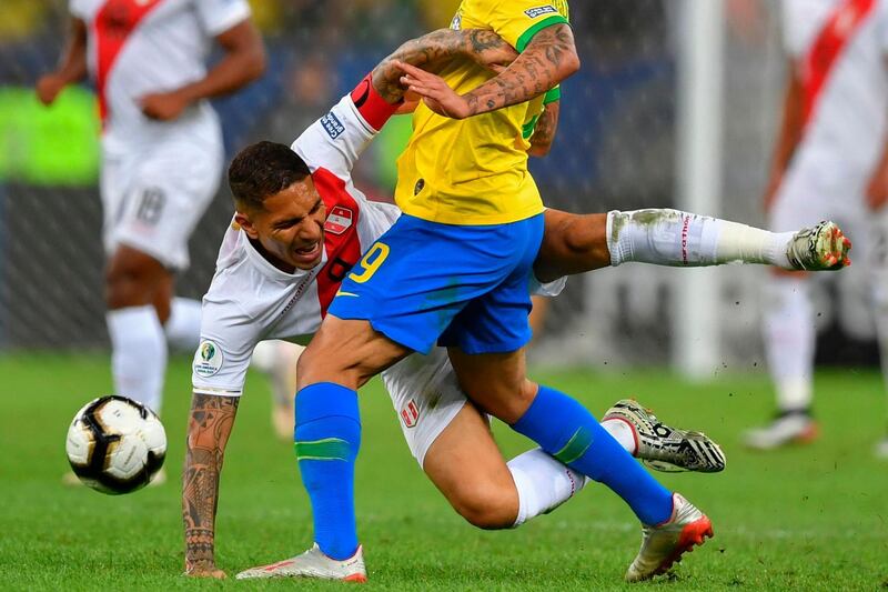 Peru's Paolo Guerrero is fouled by Jesus. AFP