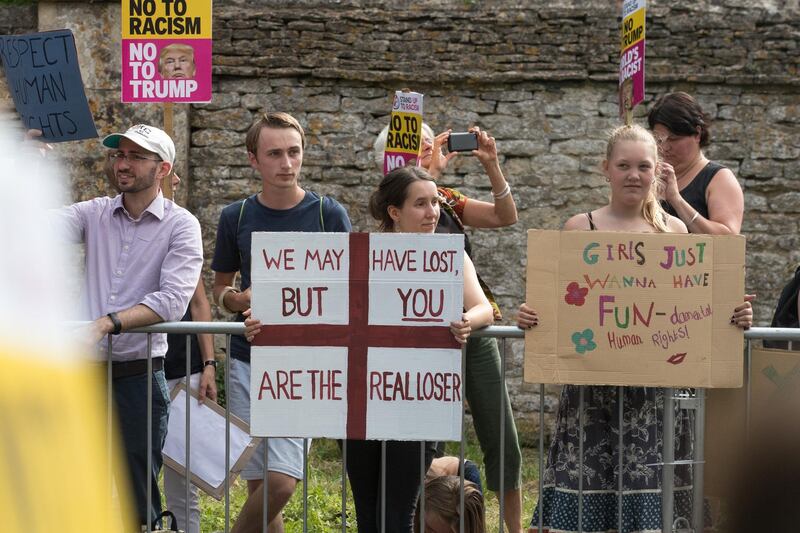 Protesters gather at the gates of Blenheim Palace. Getty Images