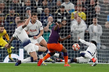 Tottenham's Danny Rose, right, flings himself at a Raheem Sterling shot before the incident is reviewed by VAR. Reuters