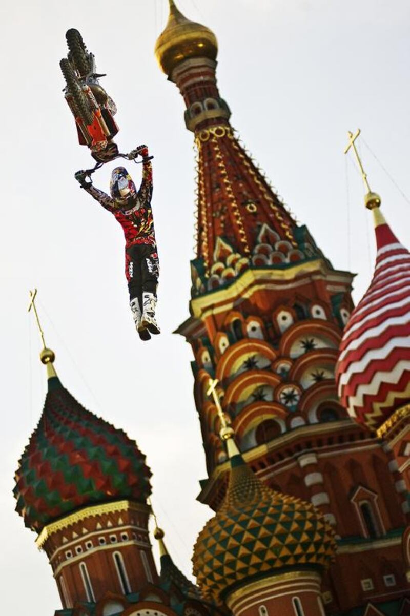 In this shot by Joerg Mitter (Austrian, born 1980), Levi Sherwood of New Zealand performs in front of the St Basil’s Cathedral in Moscow’s Red Square, Russia, June 24, 2010. Courtesy Joerg Mitter / Limex Images