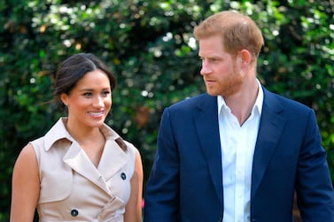 FILE - In this Wednesday Oct. 2, 2019 file photo, Britain's Harry and Meghan, Duchess of Sussex arrive at the Creative Industries and Business Reception at the British High Commissioner's residence, in Johannesburg, where they will meet with representatives of the British and South African business communities, including local youth entrepreneurs. British media reports said Friday Oct. 4, 2019 that Britian's Prince Harry has launched legal proceeds at the High Court against two British tabloid newspapers over alleged phone hacking. (Dominic Lipinski/Pool via AP, File)