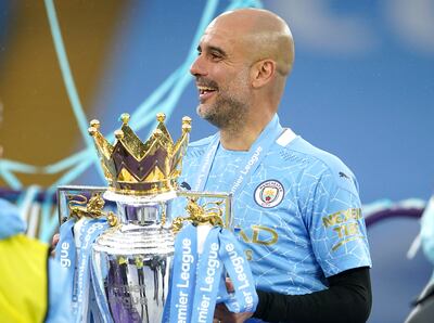 Manchester City manager Pep Guardiola with the Premier League trophy.