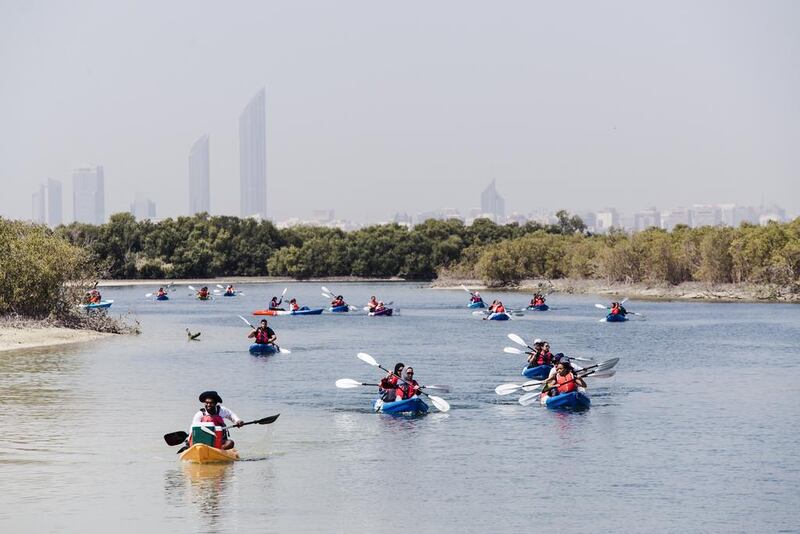 Kayakers at the Eastern Mangroves, where Mohammed Al Otaiba, The National’s Editor-in-Chief, launched The National Excursions, a series on the UAE’s hidden gems. Alex Atack for The National