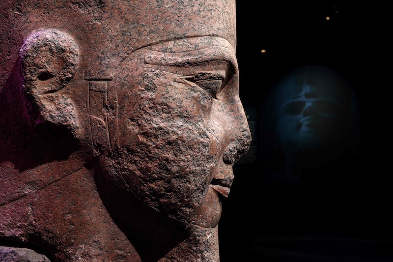 The head of a colossal statue of Ramses II. AFP