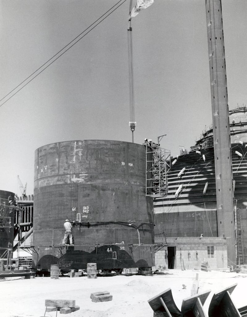 Petroleum tank being built, Dubai Creek, United Arab Emirates. (Photo by Barbara Wace/Royal Geographical Society via Getty Images)