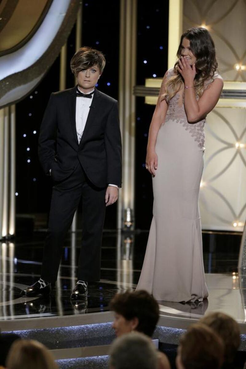 Host Amy Poehler and Miss Golden Globe Sosie Bacon. Reuters