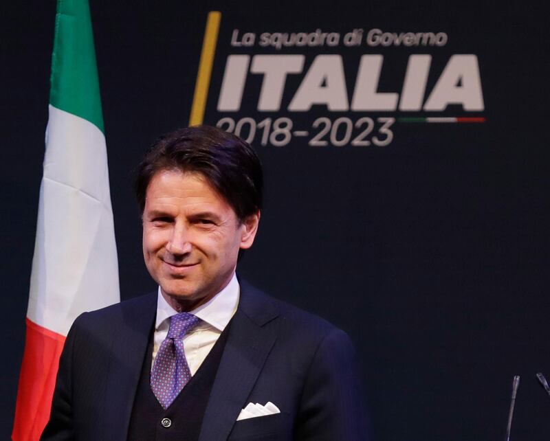 In this photo taken on Thursday, March 1, 2018, Giuseppe Conte attends a meeting in Rome. Italian media describe Conte as most likely to be the choice of Italy's main populist leaders to head the coalition government they hope to form.  (AP Photo/Alessandra Tarantino)