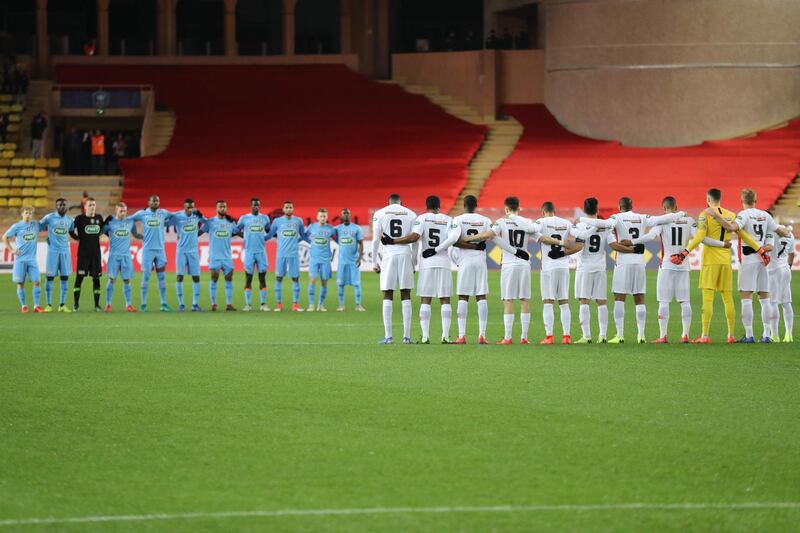 Players pay tribute to Sala before the start of the French Cup match between Monaco and Metz at the Louis II stadium in Monaco. AFP