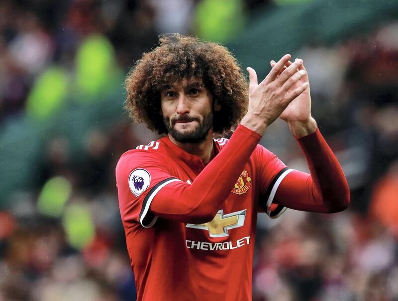 Soccer Football - Premier League - Manchester United vs Crystal Palace - Old Trafford, Manchester, Britain - September 30, 2017   Manchester United's Marouane Fellaini applauds fans after the match   Action Images via Reuters/Jason Cairnduff  EDITORIAL USE ONLY. No use with unauthorized audio, video, data, fixture lists, club/league logos or "live" services. Online in-match use limited to 75 images, no video emulation. No use in betting, games or single club/league/player publications. Please contact your account representative for further details. - RC17E70DB510