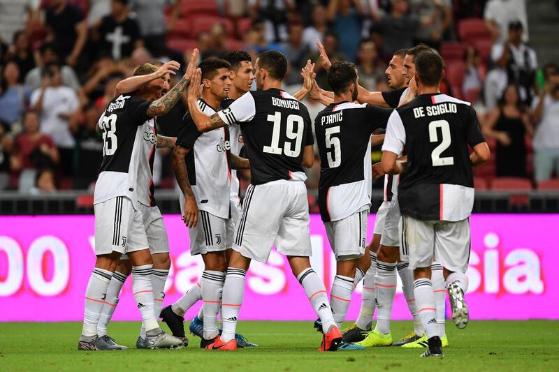 Juventus players celebrate Higuain's equaliser. Getty