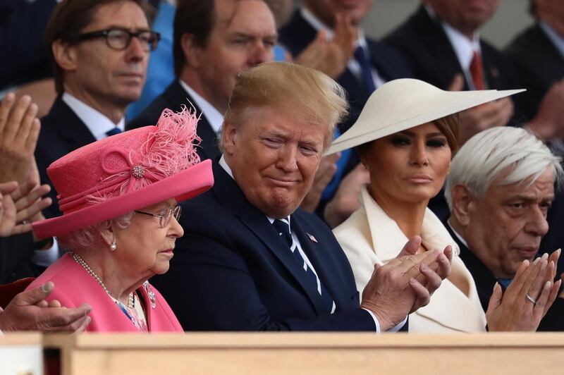 President of the United States, Donald Trump and First Lady of the United States, Melania Trump sit next to Queen Elizabeth II during the D-Day Commemorations in Portsmouth, England. Getty Images