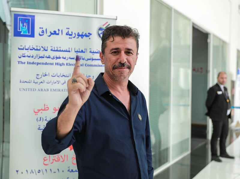 Abu Dhabi, UAE.  May 10, 2018. Iraqi voting station at the Abu Dhabi National Exhibition Centre.  Atheel Amer, a registered Iraqi voter proudly shows off his finger with indelible ink outside the voting station.
Victor Besa / The National
National
Reporter:  Haneen Dajani