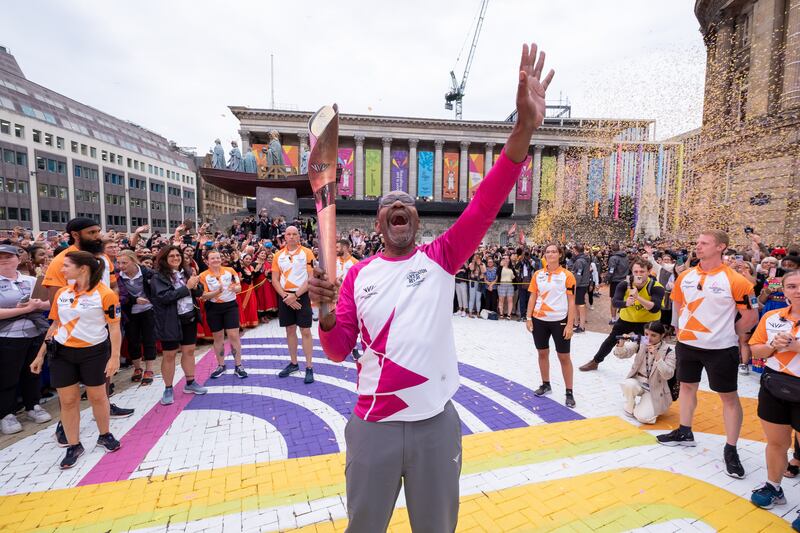 Sir Lenny holds the baton aloft in Birmingham. Getty Images